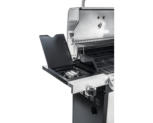 Detailansicht eines Gasgrills mit Seitenbrenner und Grillrost