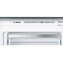 Logo Bosch. Intérieur d''un congélateur avec affichage de la température.