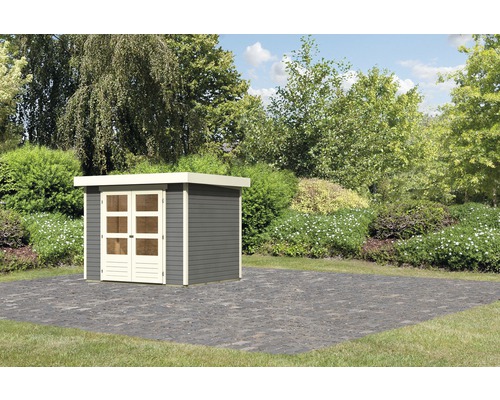 Abri de jardin avec toit plat et double porte dans le jardin