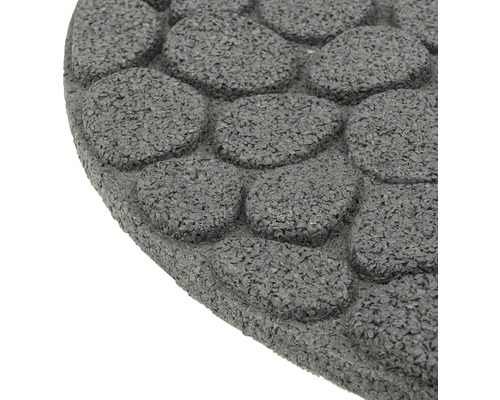 Gros plan d''un tapis de sol avec motif de pierres en caoutchouc