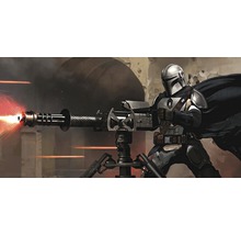 Ein Mandalorianer mit schwerer Waffe auf einem Dreibeinstativ.