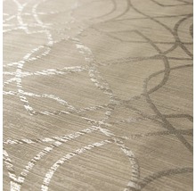 Gros plan d''un papier peint beige avec un motif circulaire