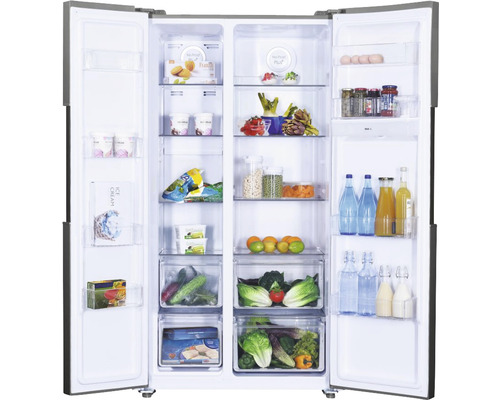 Réfrigérateur combiné américain ouvert avec des aliments