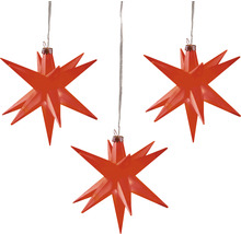 Drei hängende rote Weihnachtssterne