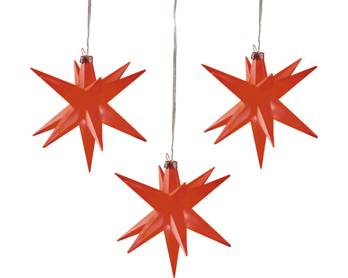 Drei hängende rote Weihnachtssterne