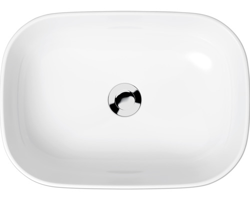 Vue de dessus d''un lavabo en céramique avec garniture de vidange