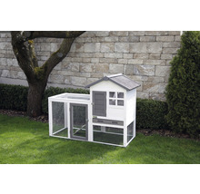 Poulailler avec enclos extérieur dans le jardin