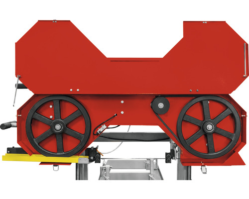 Vue détaillée d''une scie à ruban avec roues motrices et lame de scie