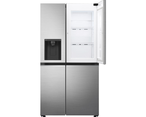 Réfrigérateur en plusieurs parties avec machine à glaçons et une porte ouverte.