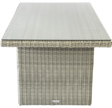 Table de jardin avec plateau en verre et tressage en rotin