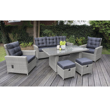 Ensemble de mobilier de jardin avec table, canapé, fauteuils et tabourets sur une terrasse