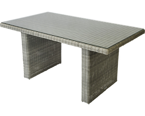 Table de salle à manger pour le jardin avec plateau en verre et aspect rotin