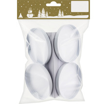 Vier Teelichthalter in einer Verpackung