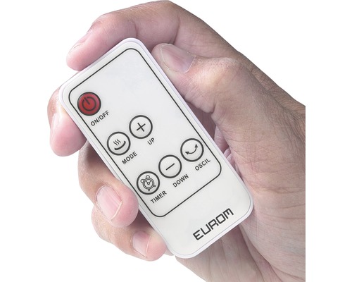 Une main tient une télécommande blanche Eurom.