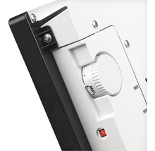 Vue détaillée d''un appareil de chauffage avec régulateur de température