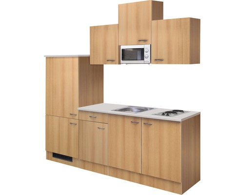 Küchenzeile mit Spüle, Kochfeld, Mikrowelle und Schränken