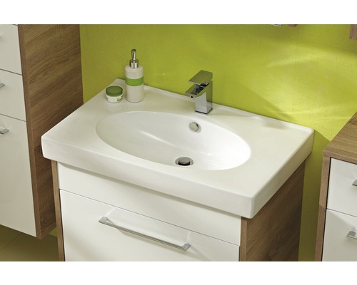 Meuble-lavabo avec meuble sous-vasque et robinet dans la salle de bain