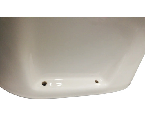 Vue détaillée d''un lavabo en céramique avec trous de fixation.