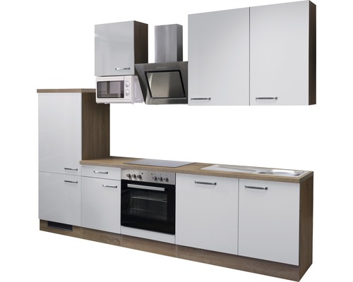 Cuisine complète avec évier, cuisinière, hotte aspirante, micro-ondes et armoires murales