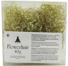 Décoration dorée en fil de cuivre dans un emballage transparent