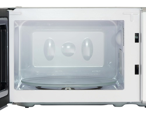 Innenansicht einer Mikrowelle mit Drehteller