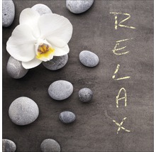 Décoration avec orchidée, pierres et l''inscription Relax