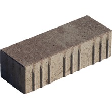 Pavé individuel avec côté rainuré