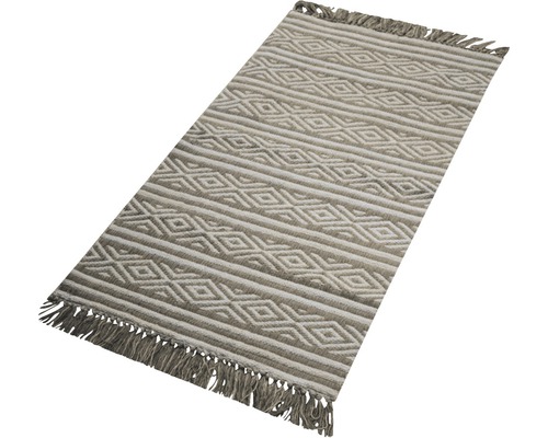Teppich mit geometrischem Muster und Fransen
