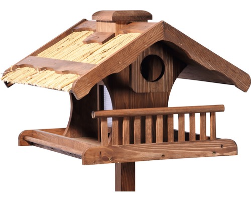 Maison pour oiseaux en bois avec toit de chaume