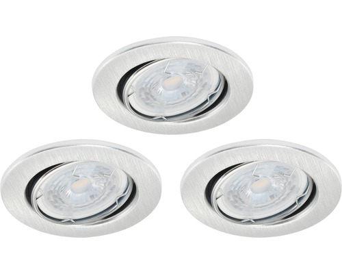 Trois spots encastrables avec une surface ronde et brossée
