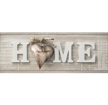 Dekoratives Holzschild mit dem Wort HOME und einem Herzanhänger