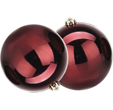 Deux boules de Noël rouges avec des attaches dorées