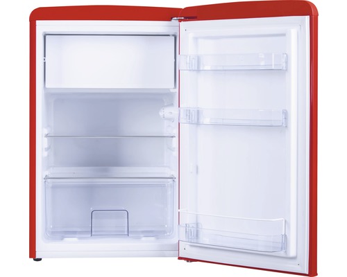 Réfrigérateur rouge ouvert avec étagères et tiroir