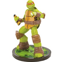 Figurine Michelangelo Tortue Ninja avec nunchakus sur plaque d''égout