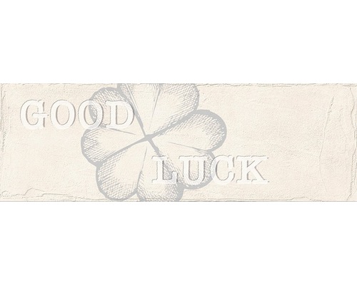Feinsteinzeug Dekorfliese Brick grey 11 x 33,15 cm Dekoratives Schild mit Kleeblatt und dem Text ''Good Luck''.