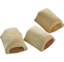 Drei Hundesnacks mit unterschiedlichen Füllungen.