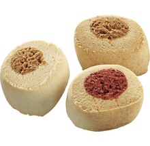 Trois friandises pour chiens avec différentes garnitures