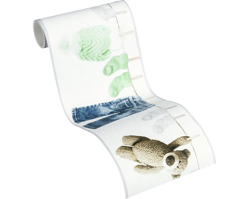 Tapetenrolle mit Motiv von Babykleidung und einem Teddybär