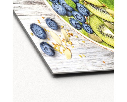 Dekoratives Bild einer Müslischale mit Blaubeeren, Kiwi und Mandeln