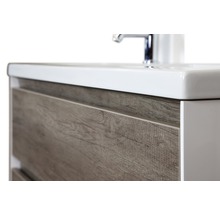 Vue détaillée d''un meuble sous-lavabo avec tiroirs aspect bois