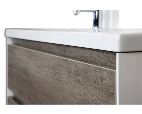 Vue détaillée d''un meuble sous-lavabo avec tiroirs aspect bois