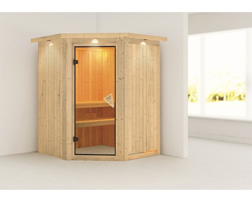 Sauna d''angle en bois avec porte vitrée et éclairage intérieur.