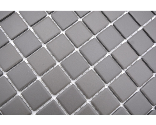 Gros plan de carreaux de mosaïque gris