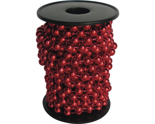 Dekokette mit roten Perlen auf einer schwarzen Spule