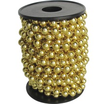 Kette mit goldenen Kugeln auf einer Spule