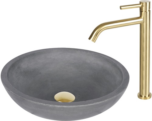 Graues Aufsatzwaschbecken aus Beton mit goldfarbener Armatur