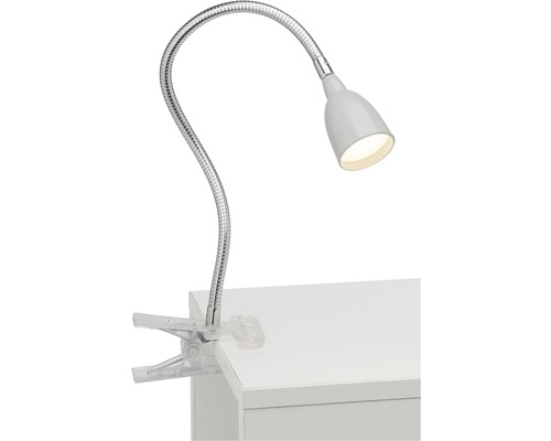 Lampe à pince avec bras flexible sur une table