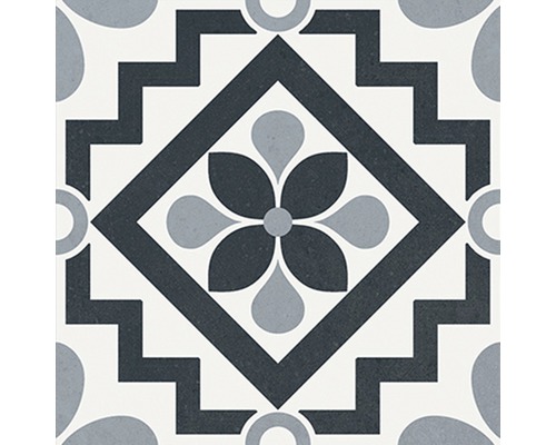 Dekorative Bodenfliese mit floralem Muster und geometrischen Elementen