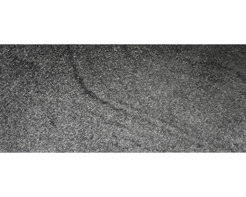 Gros plan d''une surface sombre et scintillante