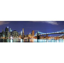Vue panoramique de la skyline de New York avec le pont de Brooklyn de nuit